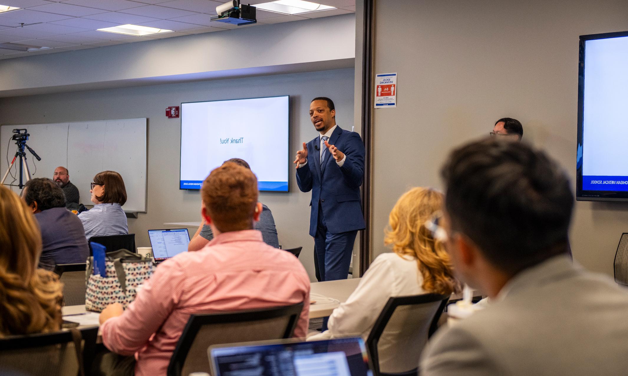 An image of Cornelius James leading a session for OUWB